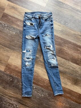 American Eagle Outfitters Women's Ripped next level stretch Skinny Jeans - Blue